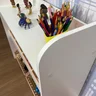 organizador de brinquedos com prateleira 4 caixas pequenas e 2 grandes 3